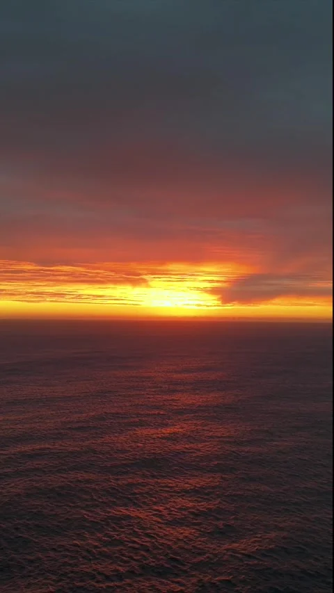 Drone Aerial of Dramatic Sunrise Over the Indian Ocean, South Africa.vertical Stock Footage 341028230