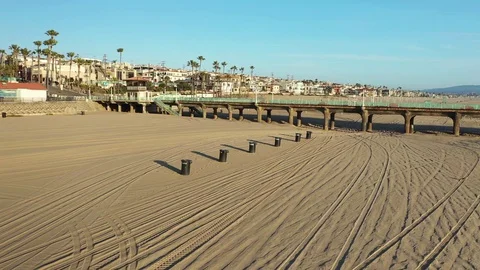 Drone aerial empty CA beach and Manhattan Pier during pandemic Video stock 127610233