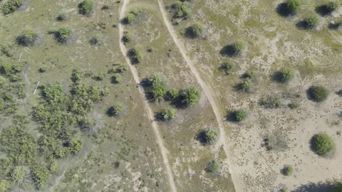 Drone Aerial of Empty Dirt Bike Trail, spinning down shot, Oregon Stock Footage