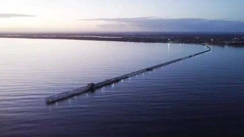 Drone aerial flight over ocean at Busselton jetty at sunrise Stock-Footage 302574664