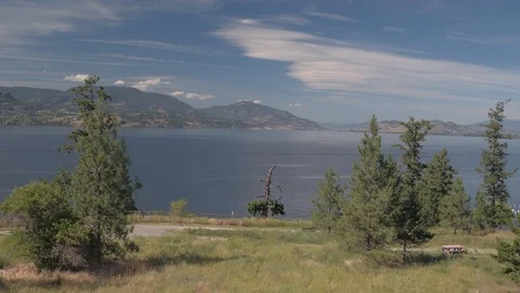 Drone aerial fly-through of Cedar Creek Park Okanagan Lake in Kelowna, BC Stock Footage 122226270