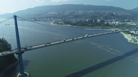 Drone aerial flying over a bridge and vehicle traffic Stock Footage 239479519