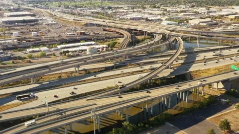 Drone Aerial Flying Parallel to a Busy Freeway in the Late Afternoon Video stock 217835788