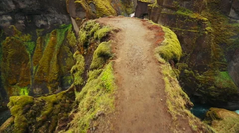 Drone Aerial Footage over the edge of magnificent canyon waterfall and river. Stock Footage