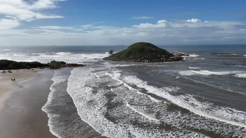 Drone aerial forward flight video over beach and small island in Santa Catarina Stock Footage 316360501