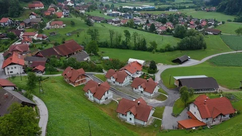 Drone aerial forward flying view of small countryside village Video stock 120072572