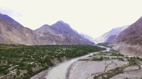 Drone Aerial of Gilgit Valley with River and Mountains, Northern Pakistan 動画素材 320495344