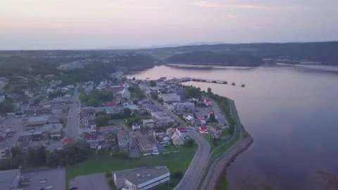 Drone aerial high angle seaside port village at dusk twilight. Stock Footage 169321675