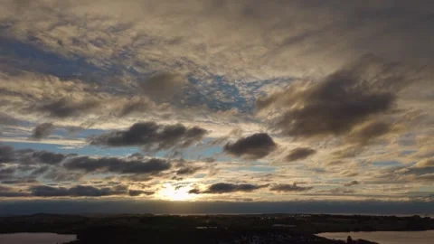 Drone Aerial Highlighting a Clouded Blue Sky Stock Footage 323286486