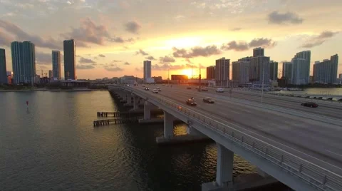 Drone Aerial Hover Next to Miami Bridge Sunset 4K Stock Footage 63273361