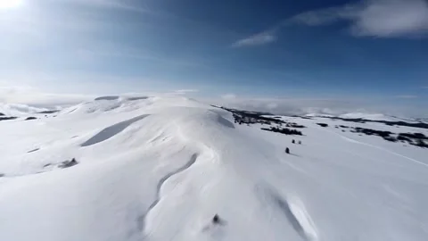 Drone aerial hyperlapse over snowy Big Horn mountains 動画素材 224159409