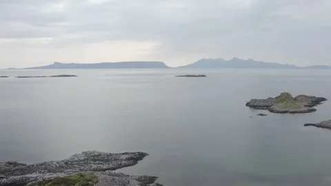 Drone Aerial of Isles of Eigg and Rum Stock Footage 247618139