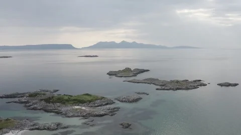 Drone Aerial of Isles of Eigg and Rum Stock Footage 247618192