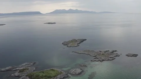 Drone Aerial of Isles of Eigg and Rum Stock Footage 247618353