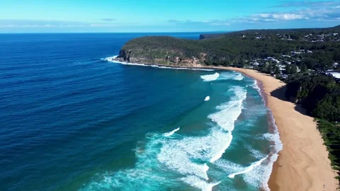Drone aerial landscape of ocean waves breaking along MacMasters Beach shoreline Stock Footage 341324817
