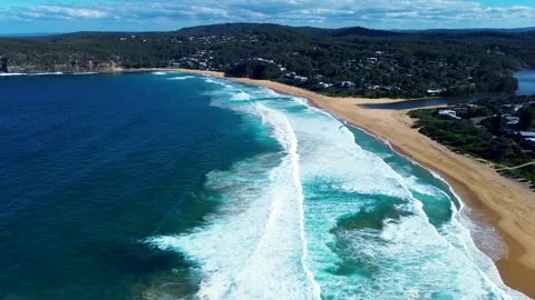 Drone aerial landscape of ocean waves crashing along sandy Copacabana Beach Stock Footage 341330871