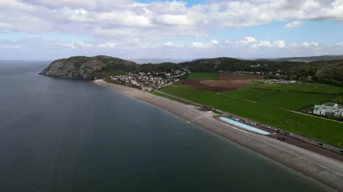 Drone Aerial Of The Little Orme, LLandudno, Coastal Town Of North Wales Stock Footage 158585513