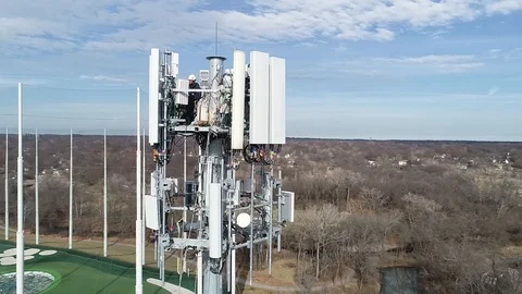 Drone Aerial Men Working Cell tower 1 Stock Footage 120885423