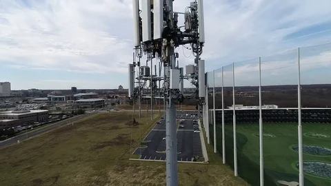Drone Aerial Men Working Cell tower 3 Stock Footage 120885429