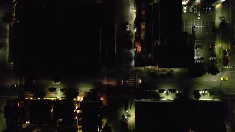 Drone aerial moving backward while looking straight down at a downtown San Vídeo Stock 332678961