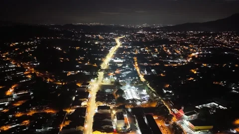 Drone aerial night light trail over city street Stock Footage 333049915