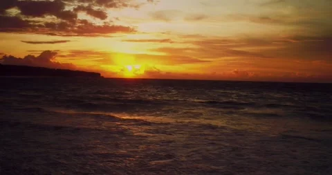 Drone Aerial of Ocean Waves and Golden Sunset Over Sea 스톡 동영상 331277787