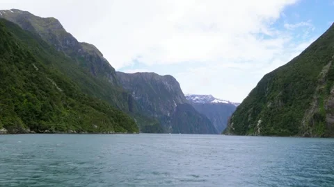 Drone Aerial Over Large River with Mountains on Both Sides Stock Footage 314696285
