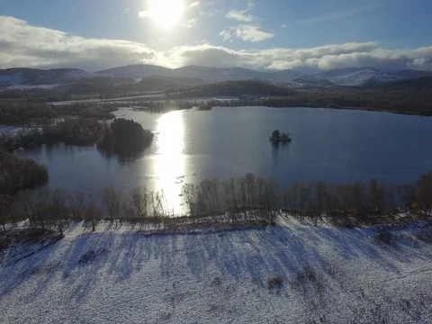 Drone Aerial - Pan Down to Snowing Shore Stock-Footage 82920798
