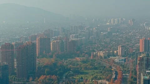 Drone Aerial Pan of Parque Araucano Park and High Rise Residential Buildings in Vídeos de archivo 337436152