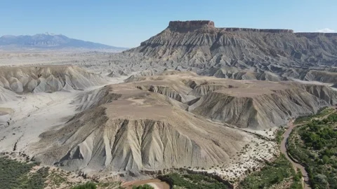Drone Aerial Panning Right Over Eroded Clay Badlands in Utah Stock Footage 336491508