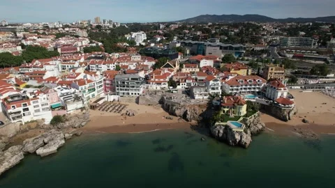 Drone aerial panning of sandy beaches along the Portuguese Riviera in Cascais Stock Footage 193993033