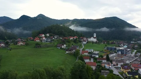 Drone aerial parallel smooth flying view of small village countryside Stock Footage 120072648