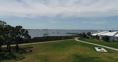 Drone Aerial Of Park Overlooking Waterfront Stock Footage