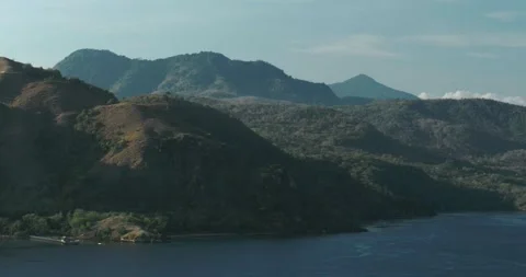 Drone Aerial Perspective of Boat Exploring Remote Indonesian Islands Stock Footage 330930041