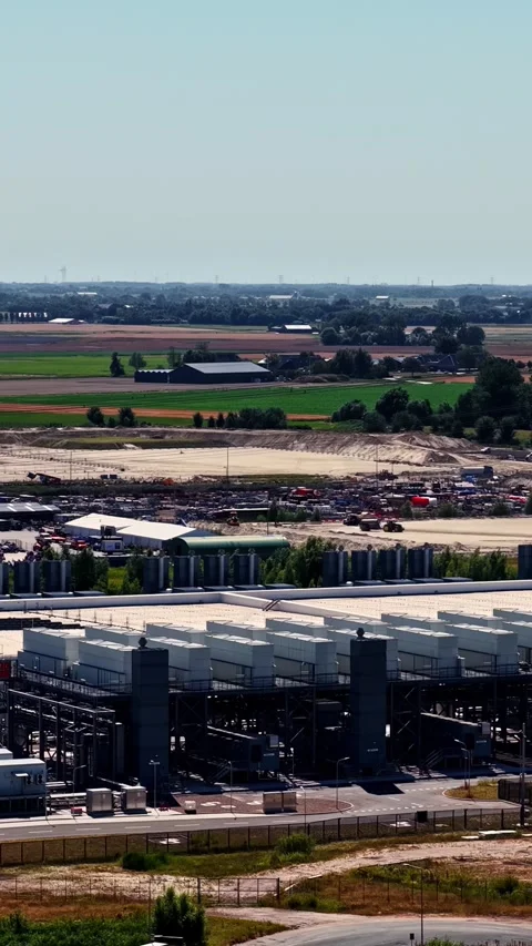Drone aerial portrait of a Google data center campus site development with Stock Footage 345504721