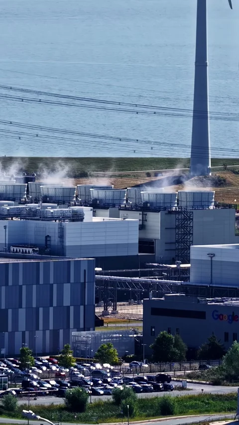 Drone aerial portrait of a Google data center campus factory building releasing Stock Footage 345504728