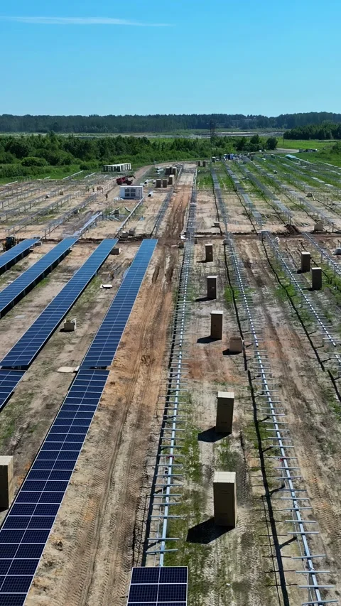 Drone aerial portrait view construction worksite development of solar panel Stock Footage 300209443