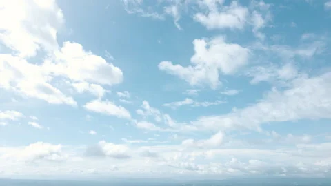 Drone Aerial of Puffy Clouds and Clear Blue Sky Stock Footage 308856834