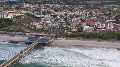 Drone Aerial Pullaway of Train along the coastline Stock Footage 125707696