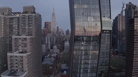 Drone aerial pulling out from the Copper building and skyline magic hour predawn Stock-Footage 248534701