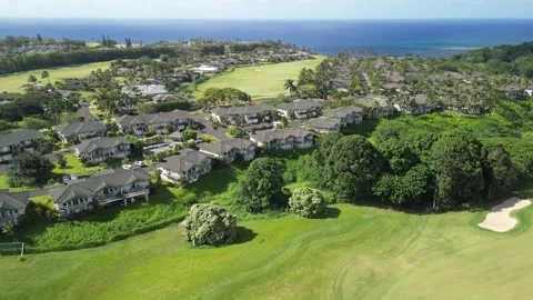 Drone Aerial of Queen Emmas Bluff section of Princeville, Kauai, Hawaii, part 1 Stock Footage 299965737