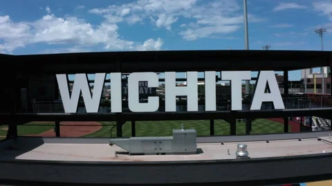 Drone aerial of Riverfront baseball stadium nameplate in Wichita Kansas 4k Stock Footage 155355430