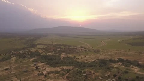 Drone aerial rotating around a sunset view of the Serengeti plains in Tanzania Stock-Footage 249348674