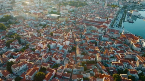 Drone aerial of Split Old Town rooftops at sunrise with Republic Square Stockbeeldmateriaal 341673891