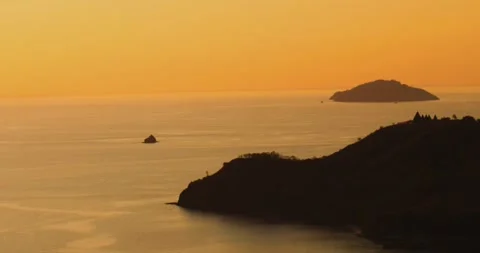 Drone aerial of sunset light over islands and ocean in Indonesia 스톡 동영상 333052657