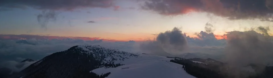 Drone aerial sunset at the Monte Pora ski area in winter season. Orobie Alps Stock Photos