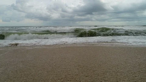 Drone Aerial super low angle waves crashing on beach Stock Footage 102730476