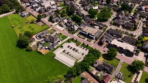 Drone aerial top-down view of a dutch town with cars driving 스톡 동영상 336594755