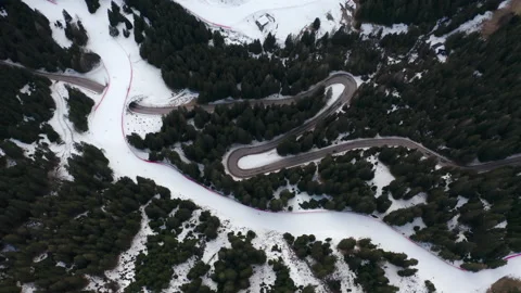 Drone aerial top down of windy Winter Roads in Italian Alps IT ALP 0160 D GR Stock Footage 143292011