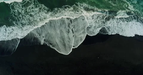 Drone aerial top view of powerful ocean waves rolling toward tropical coast Stock Footage 329461322